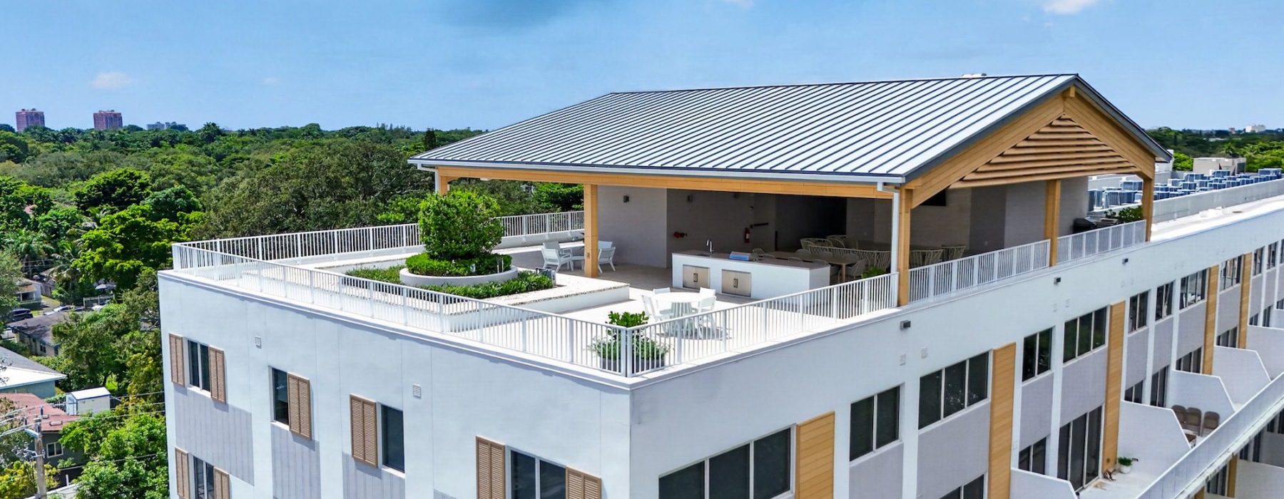 a building with a rooftop sitting area