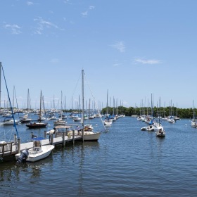 The essence of exceptional living a dock with many boats in a harbor